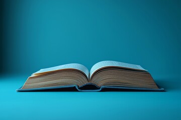 The concept of studying at a university or school is represented by an open book on the table, with education, reading, and knowledge serving as the background