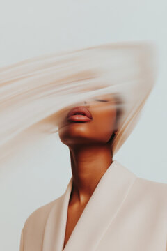 Elegant model posing with flowing fabric, fashion and beauty portrait