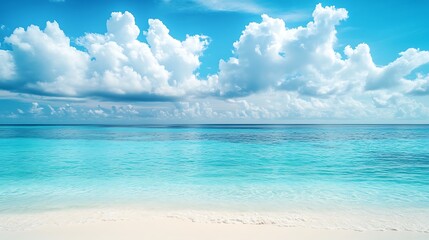 Obraz premium Idyllic tropical beach scene with turquoise water, white sand, and fluffy clouds under a vibrant blue sky.