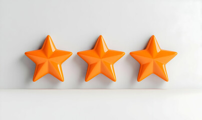 Obraz premium Three Bright Orange Decorative Stars on a White Background