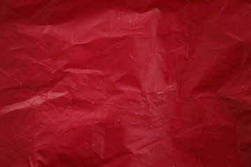 Obraz premium Texture of Red plastic bag smooth crumpled surface