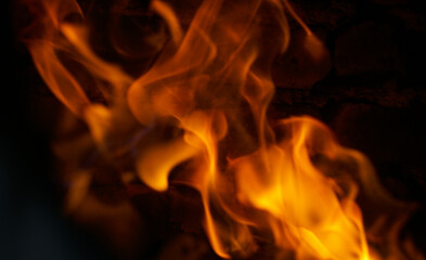 Red fire burning on a black background
