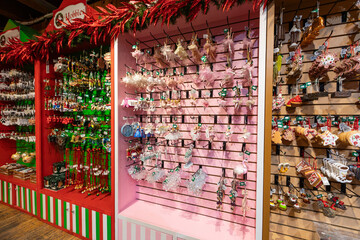 Boston, MA, USA - Dec 24, 2020 - A souvenir shop in Quincy Market displays festive Christmas ornaments, including ballerinas and gingerbread designs capturing the holiday shopping atmosphere in Boston
