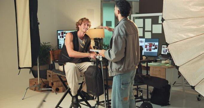Photography, high five and teamwork with men in studio for production success, creative director and editor. Achievement, branding campaign and backstage support with people on set for catalog