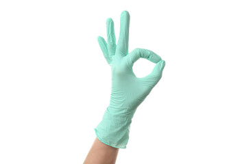 Female hand in medical glove showing OK on white background