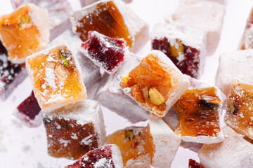 Sweet food Turkish delight, assorted rahat locum in form of cubes with nuts and powdered sugar,...