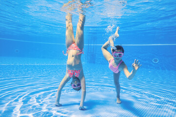 Children play in  pool at the resort