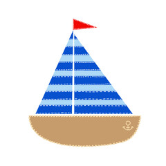 Un barco velero de tela.