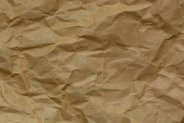 Brown crumpled paper background,Old paper vintage texture surface for background. Recycle pale brown paper crumpled texture, Cream color recycled kraft paper texture blank with copy space for text.