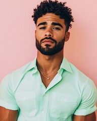 Obraz premium confident man in pastel mint button-up shirt