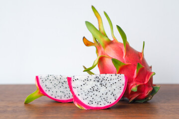 Dragon fruit on wooden table background 