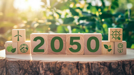 A set of wooden blocks arranged on a wooden surface, displaying the year "2050" in green text