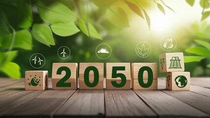 A set of wooden blocks arranged on a wooden surface, displaying the year "2050" in green text