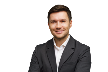 Professional man confidently smiling while wearing a dark suit and white shirt against a plain background