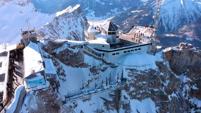 Aerial: drone flying by the mountain station close to the Zugspitze