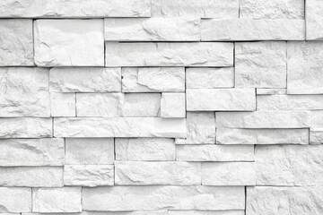 Fototapeta premium Old white brick wall background, wide panorama of masonry