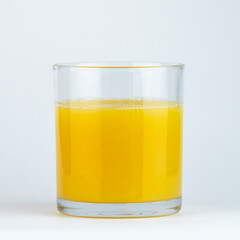 Freshly squeezed orange juice in a clear glass