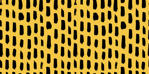 Seamless abstract pattern with irregular black brush strokes on a yellow background. Modern artistic texture for fabric, wallpaper, branding, and creative projects. Trendy and bold hand drawn design.