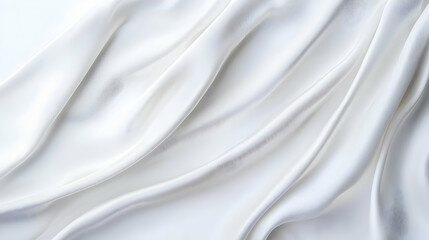 Fototapeta premium Flowing White Fabric Texture With Soft Folds And Subtle Ripples In Elegant Drapery For Luxurious Background