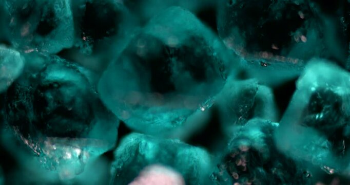 Vibrant green-blue NiSO4 crystals with perfect geometric structures under high magnification