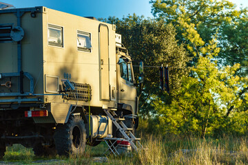 Offroad camper 4x4 truck on nature