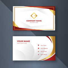 Elegant red-gold business card design on grey
