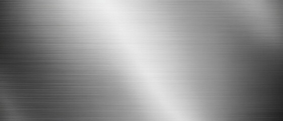 Brushed metal texture background with light reflection, showcasing industrial design and modern aesthetic for graphic design and wallpaper