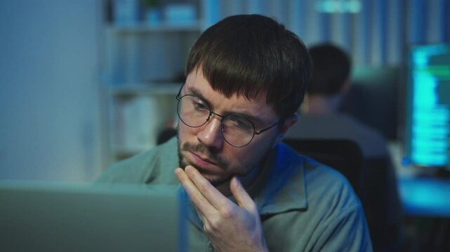 Dedicated programmer working at night, highlighting the discipline and drive behind software development.