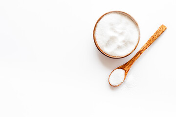 Finely grinding of edible sea salt, close-up. Maintaining acid-base balance concept