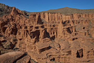 Eroded sandstone formations, canyon background. Natural landscape