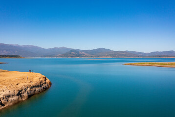 Del Maule lake and the Andes Mountains