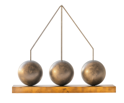 Newton’s Cradle: A Classic Physics Demonstration of Momentum and Energy Transfer with Suspended Metal Spheres in Motion