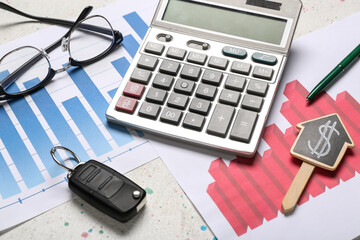Calculator, eyeglasses and car key on white background. Debt concept. Closeup