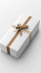 Elegant Gift Wrapped in White Paper with Golden Ribbon Bow on a Clean Minimalist Background for Special Occasions