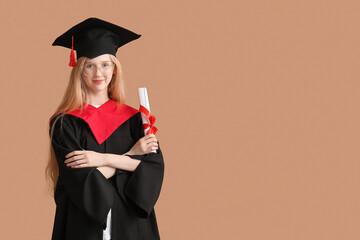 Female graduating student in mortar board with diploma on brown background