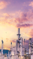 Obraz premium Vertical Oil refinery gas petrol plant industry with crude tank, gasoline supply chemical factory. Vertical horizontal Petroleum barrel fuel heavy industry oil refinery manufacturing factory plant