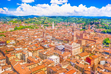 Naklejka premium A stunning aerial panoramic view of Verona, Italy, showcasing its historic cityscape, winding Adige River, and a blend of historical architecture that highlights the city's rich cultural heritage