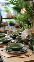 Fototapeta premium Elegant Table Setting with Green Ceramic Dinnerware and Tropical Palm Leaves for a Stylish Dining Experience