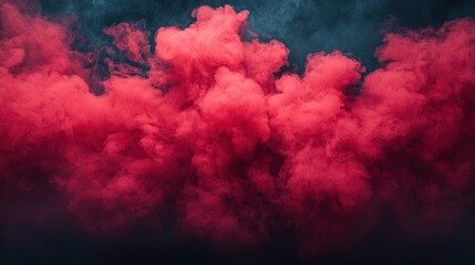 Fototapeta premium Vivid crimson smoke billows against a dark backdrop