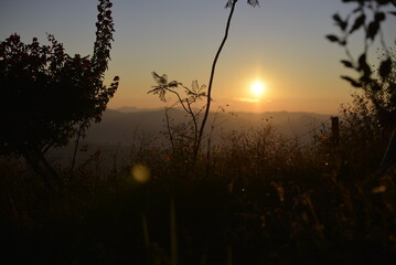 Orange sunset in a mountainous horizon