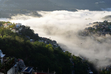 sea of cloud over steep hillside in Aizawl, Mizoram