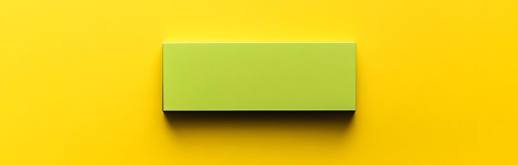 Fototapeta premium a single, minimalist lime green sticky note on a vibrant yellow background. The sticky note is rectangular, and the color combination creates a striking visual contrast