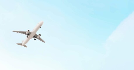 ULTRA HD. Airplane flies in blue sky. Travel. Airplane takes off against the background of blue sky.	