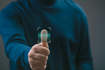 A close-up of a person showcasing a thumb with a scanning technology overlay, emphasizing biometric...