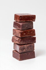 chocolate pieces on white background
