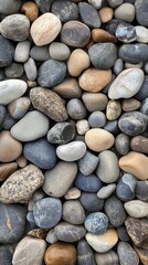 Close-Up of Smooth, Colorful River Rocks