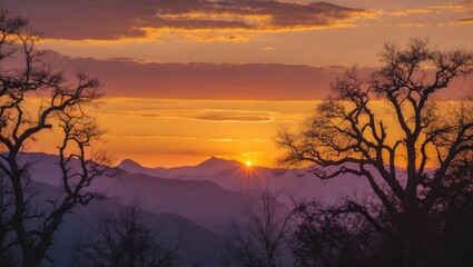 Fototapeta premium Golden Sunset Above Mountains and Trees with Dramatic Clouds
