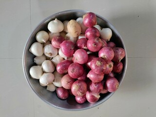 Fresh onions. Onions background. Ripe onions. Red and white onions in market