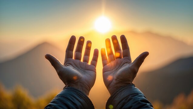 Shadow & blurred photo, A young man seeking blessings amidst the power and holiness with a sunrise backdrop over the high mountains. Spiritual Concepts.