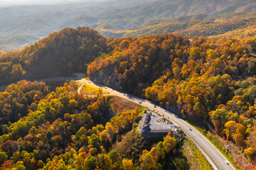 American highway in North Carolina Appalachian mountains in fall season with fast moving traffic....
